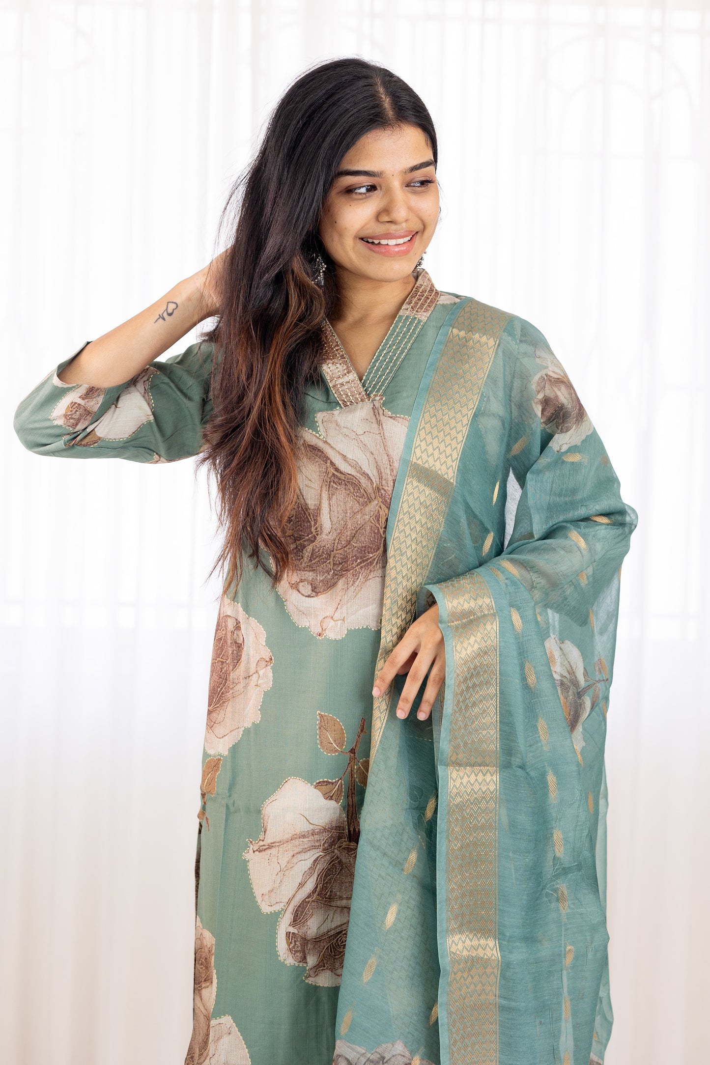 Aaradhana salwar set in light green with vertican fabric