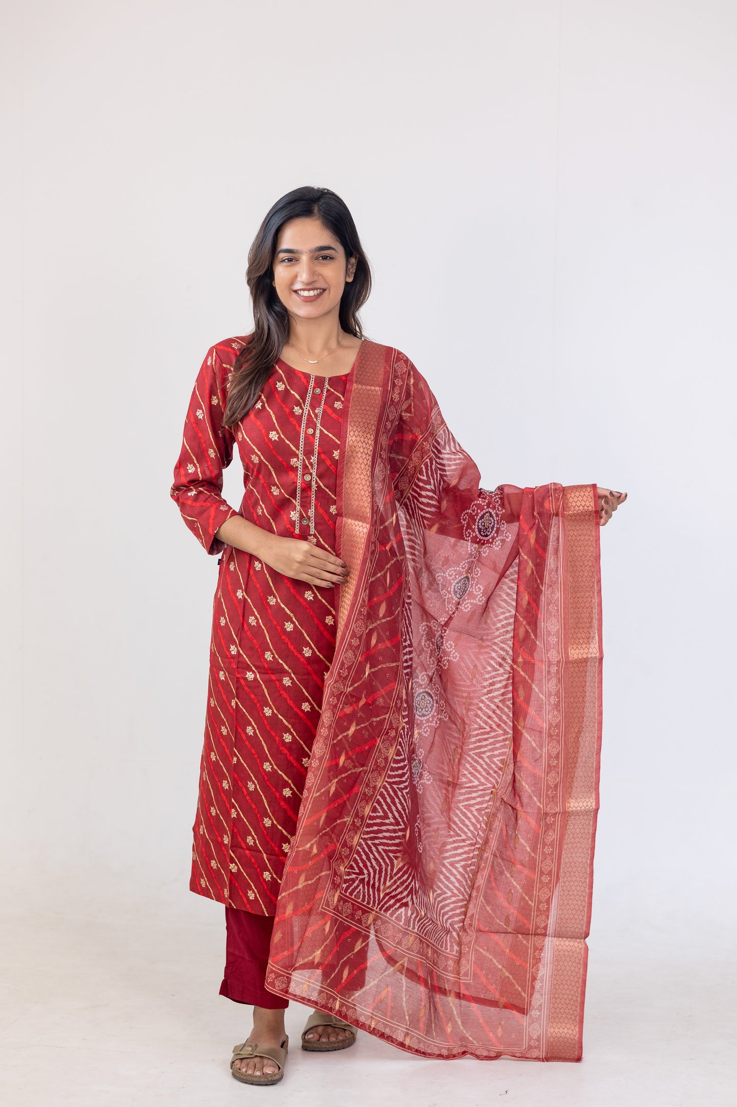 Poonguzhali salwar set in red