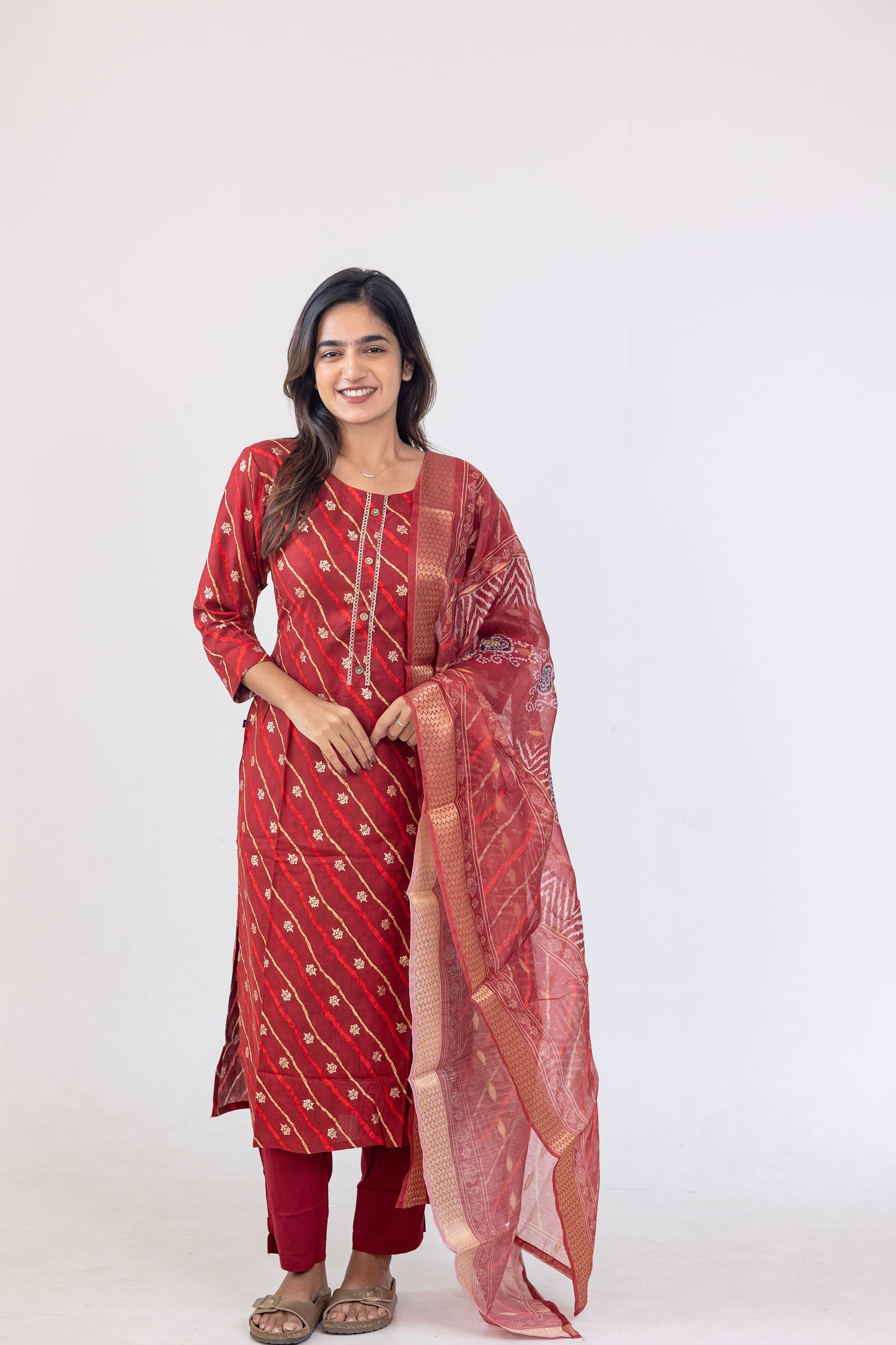 Poonguzhali salwar set in red