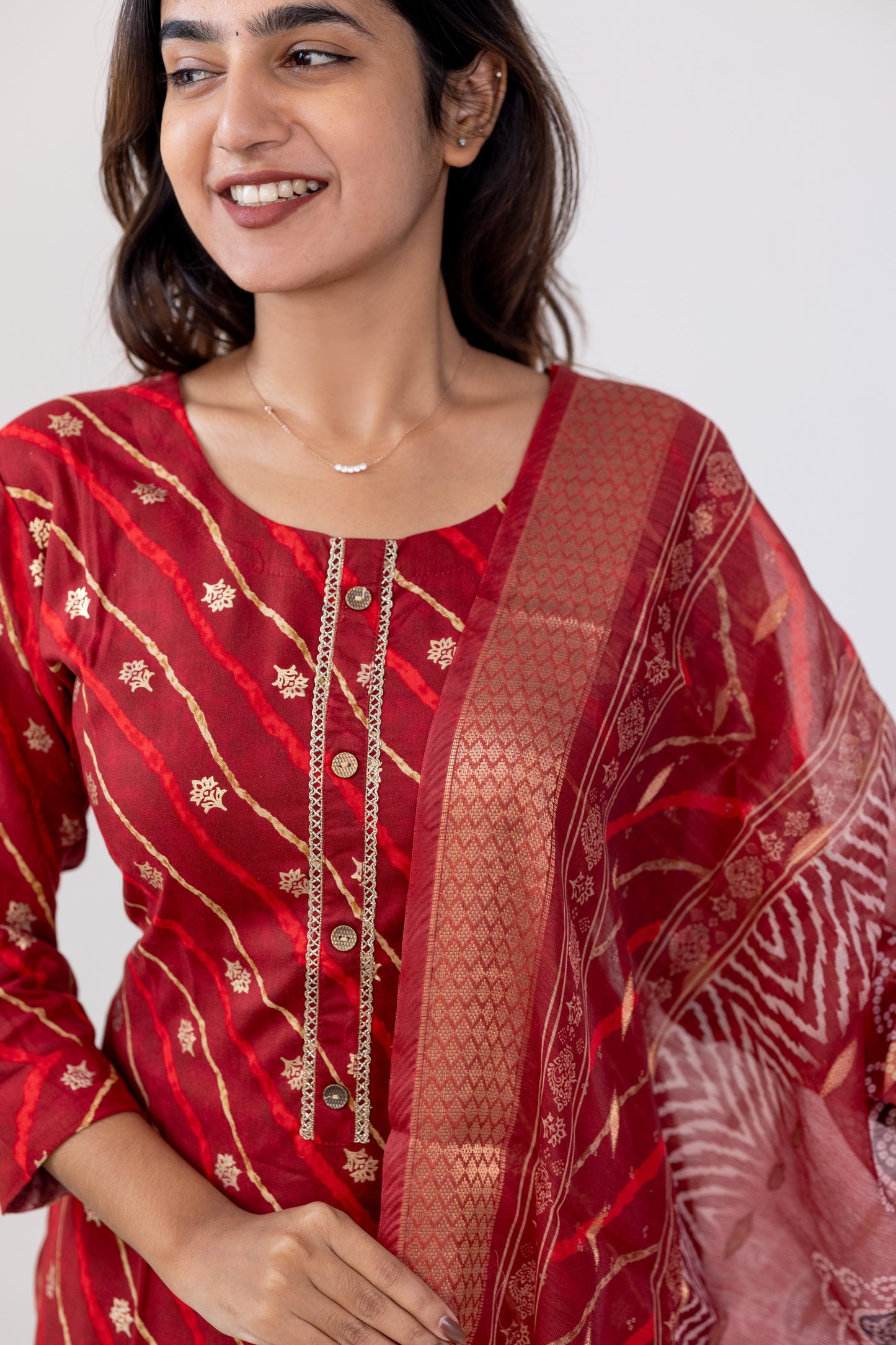 Poonguzhali salwar set in red