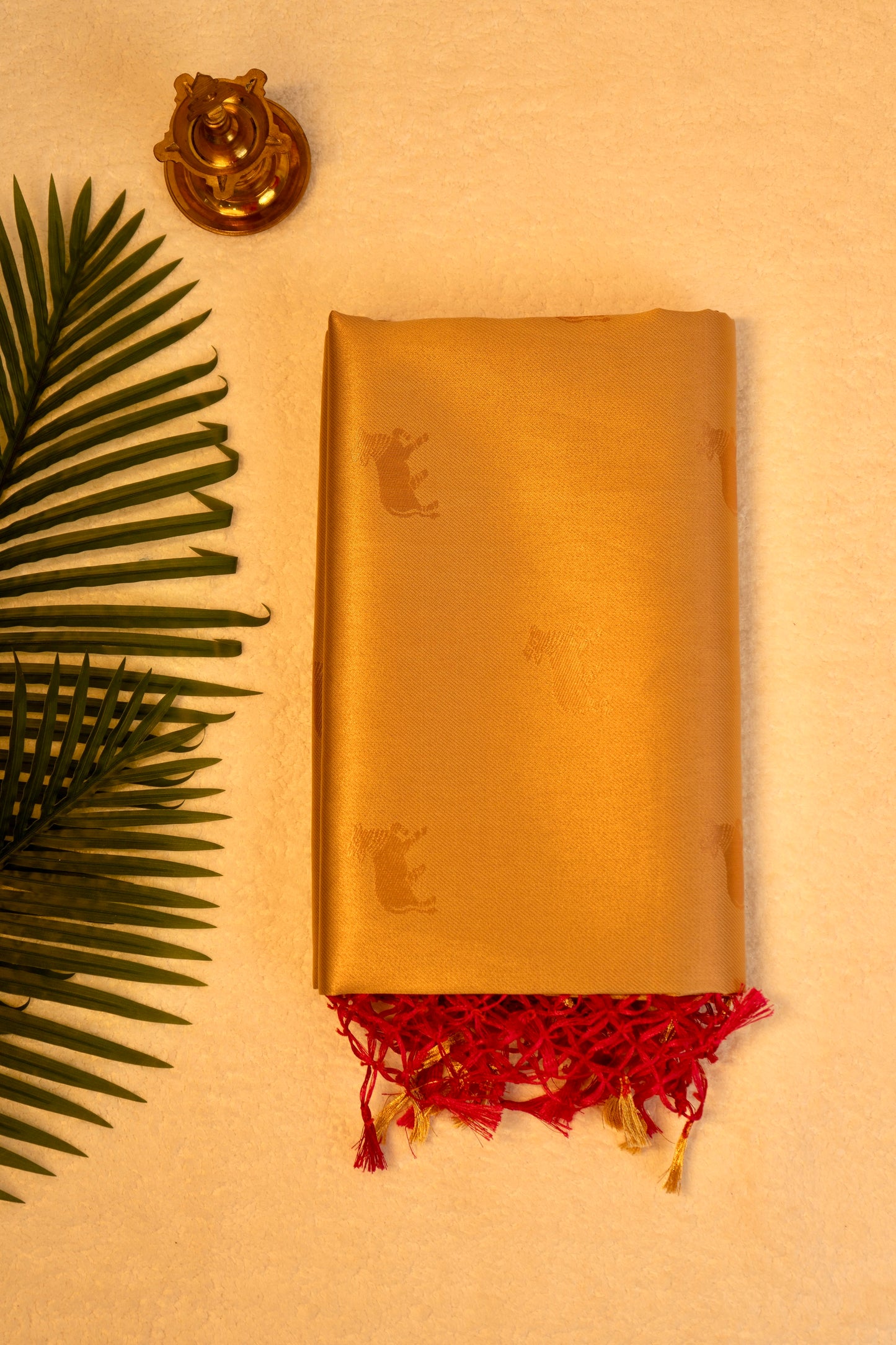 Designer saree in Cream with Red Zari Border