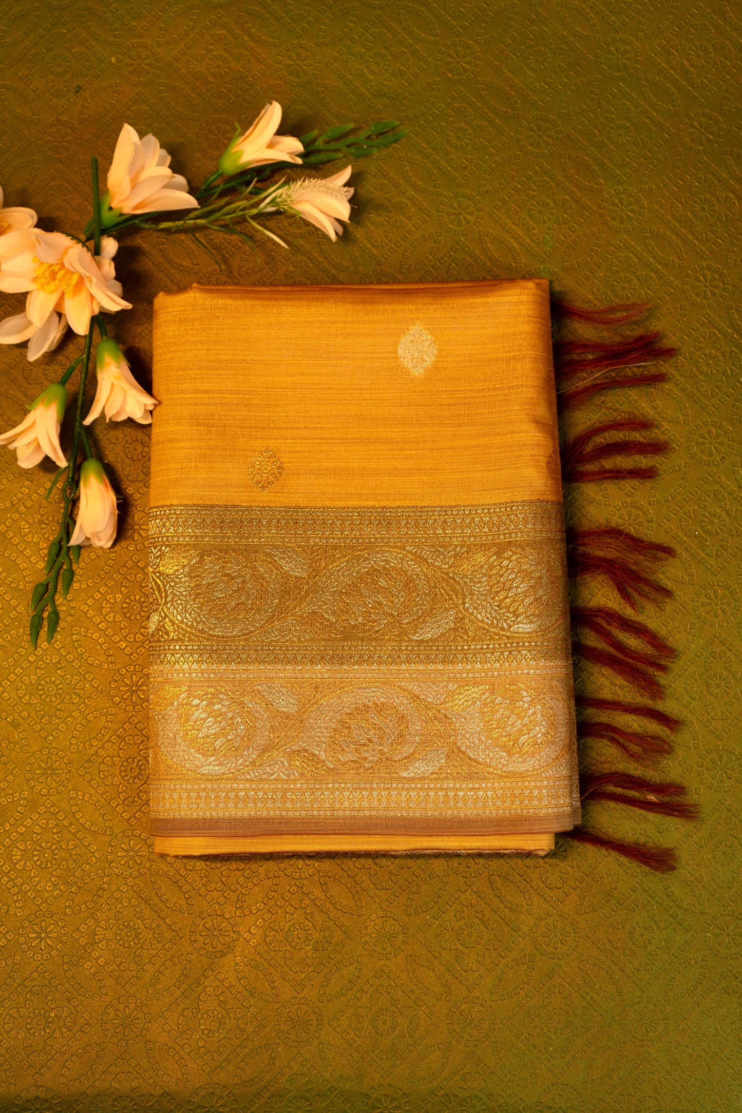 Designer saree in Mustard Yellow with Gold Zari Border