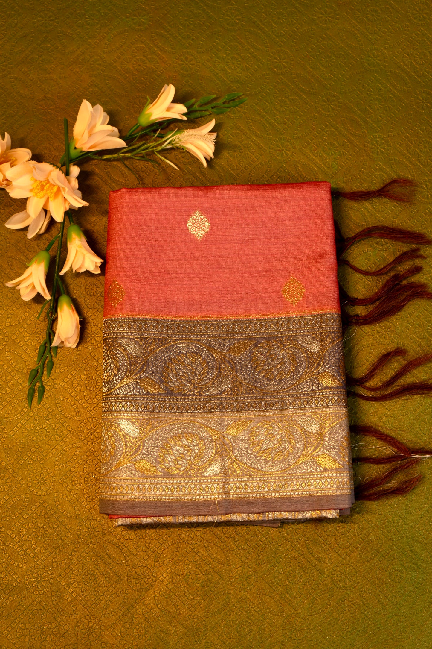 Soft silk saree in Peach with Gold Zari Border