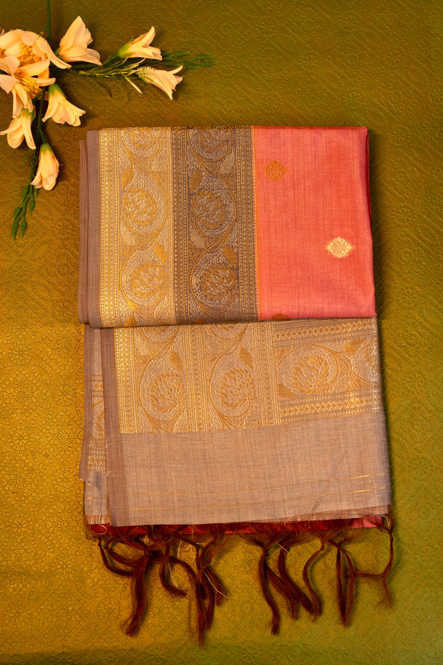 Soft silk saree in Peach with Gold Zari Border