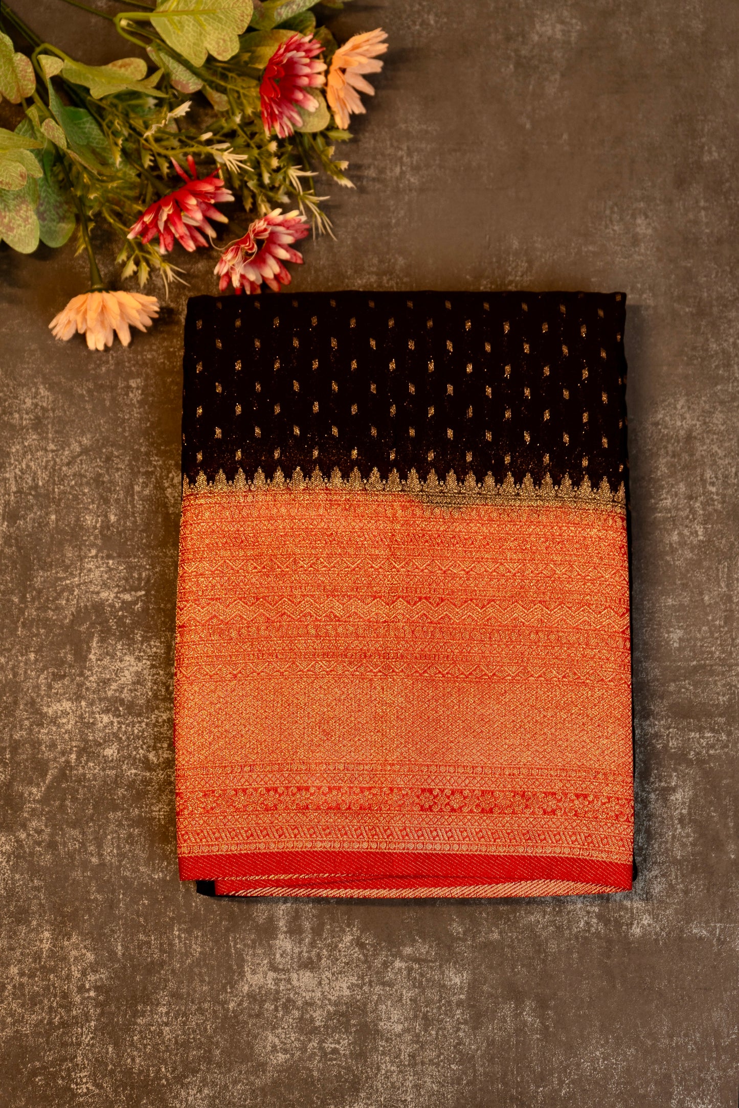 Tissue georgette saree in black and red with silver zari