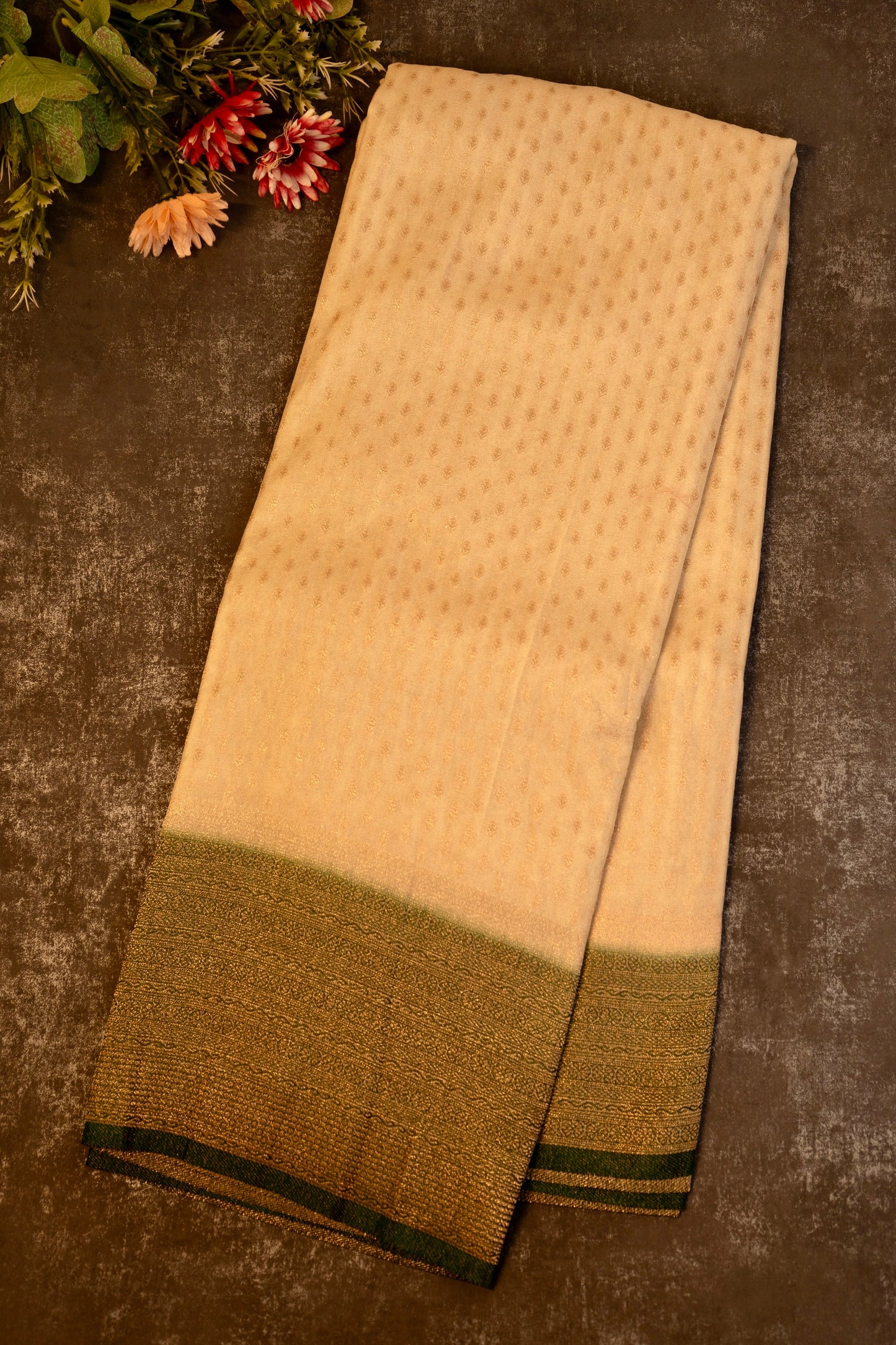 Tissue georgette saree in offwhite and dark green with silver zari