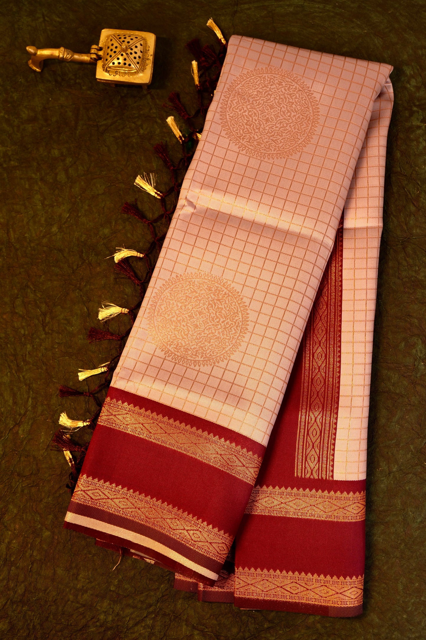 Designer saree in lotus pastel pink with gold zari