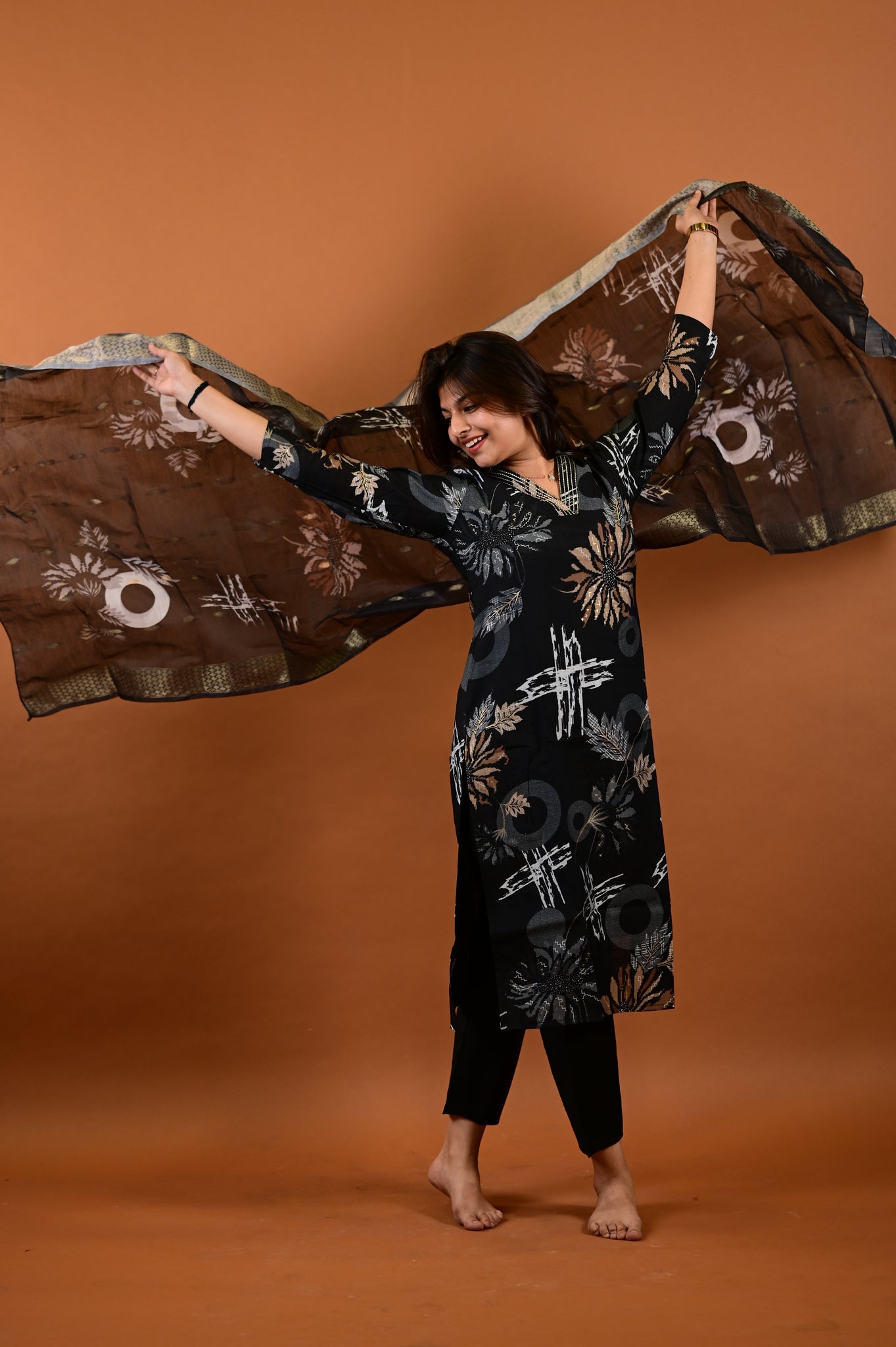 Saanvi salwar set in black with flower design in vertican fabric