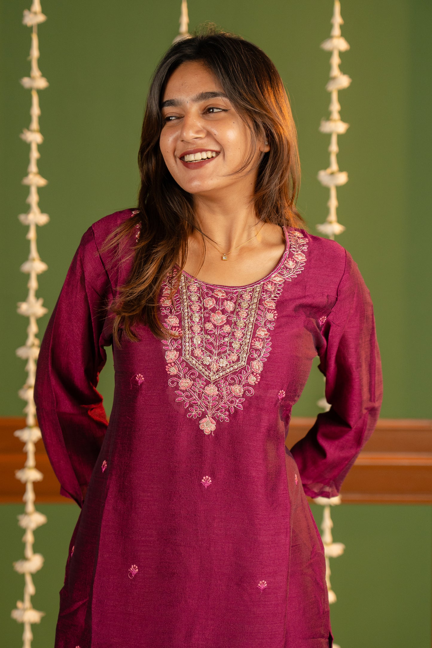 Meenakshi kurti in wine gold-toned threads