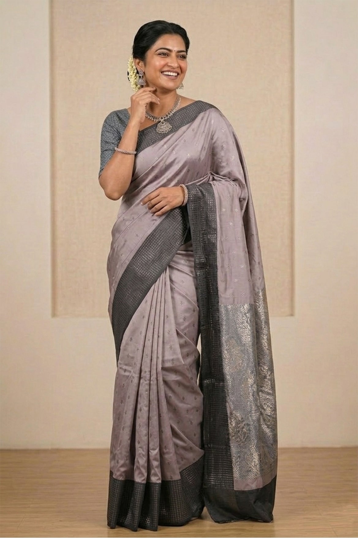 Pastel grey Belgaum silk saree with a Vaira Oosi border