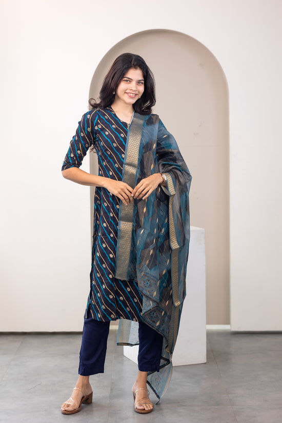 Poonguzhali salwar set in blue with gold printed design