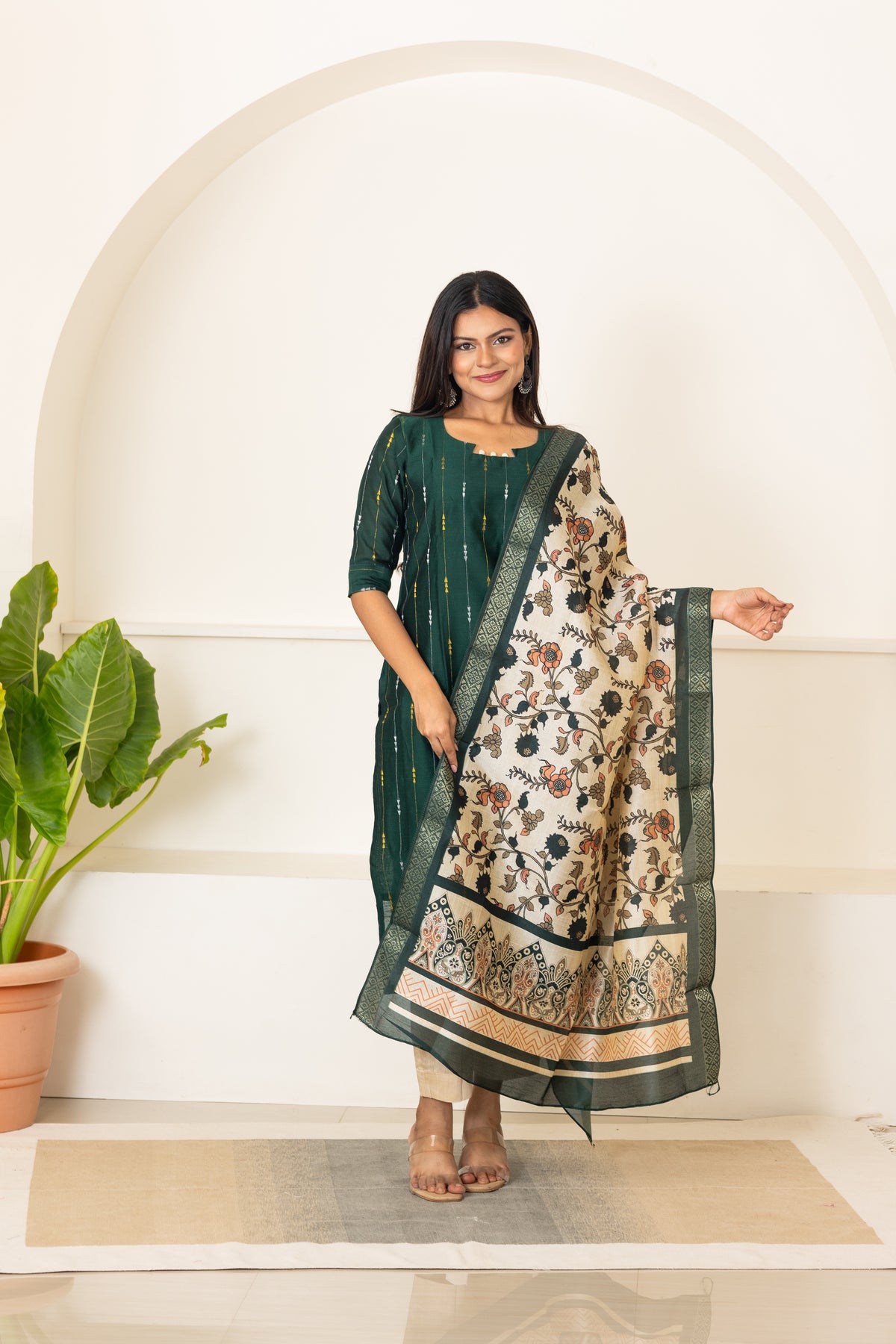 Mythiri salwar set in dark green