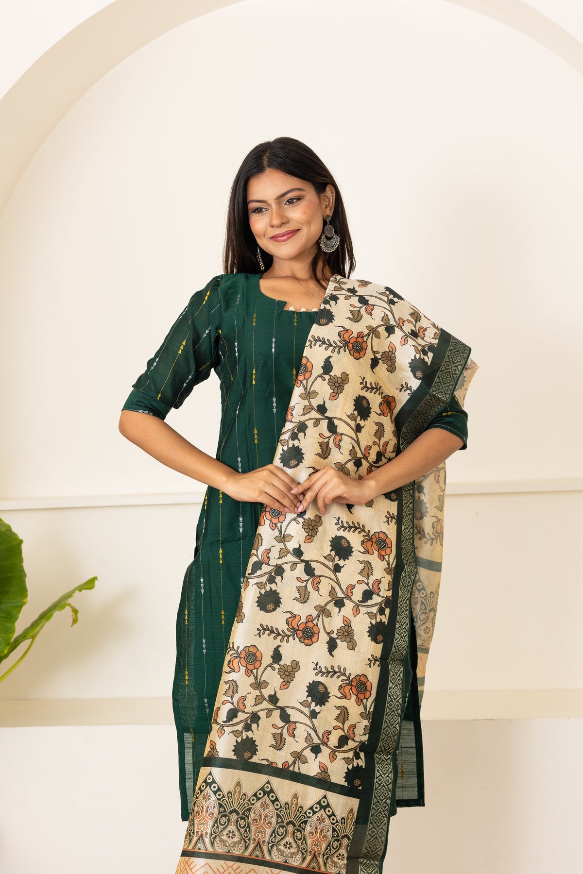 Mythiri salwar set in dark green