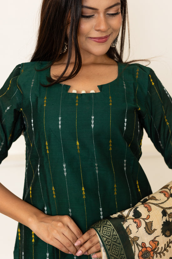 Mythiri salwar set in dark green