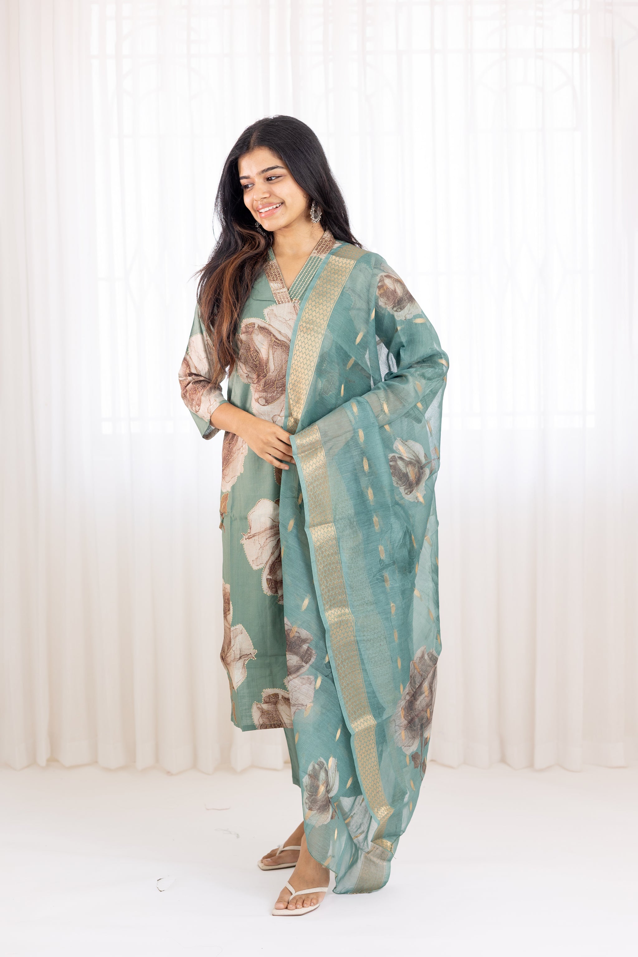 Aaradhana salwar set in light green with vertican fabric