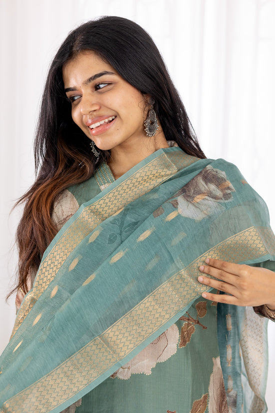 Aaradhana salwar set in light green with vertican fabric