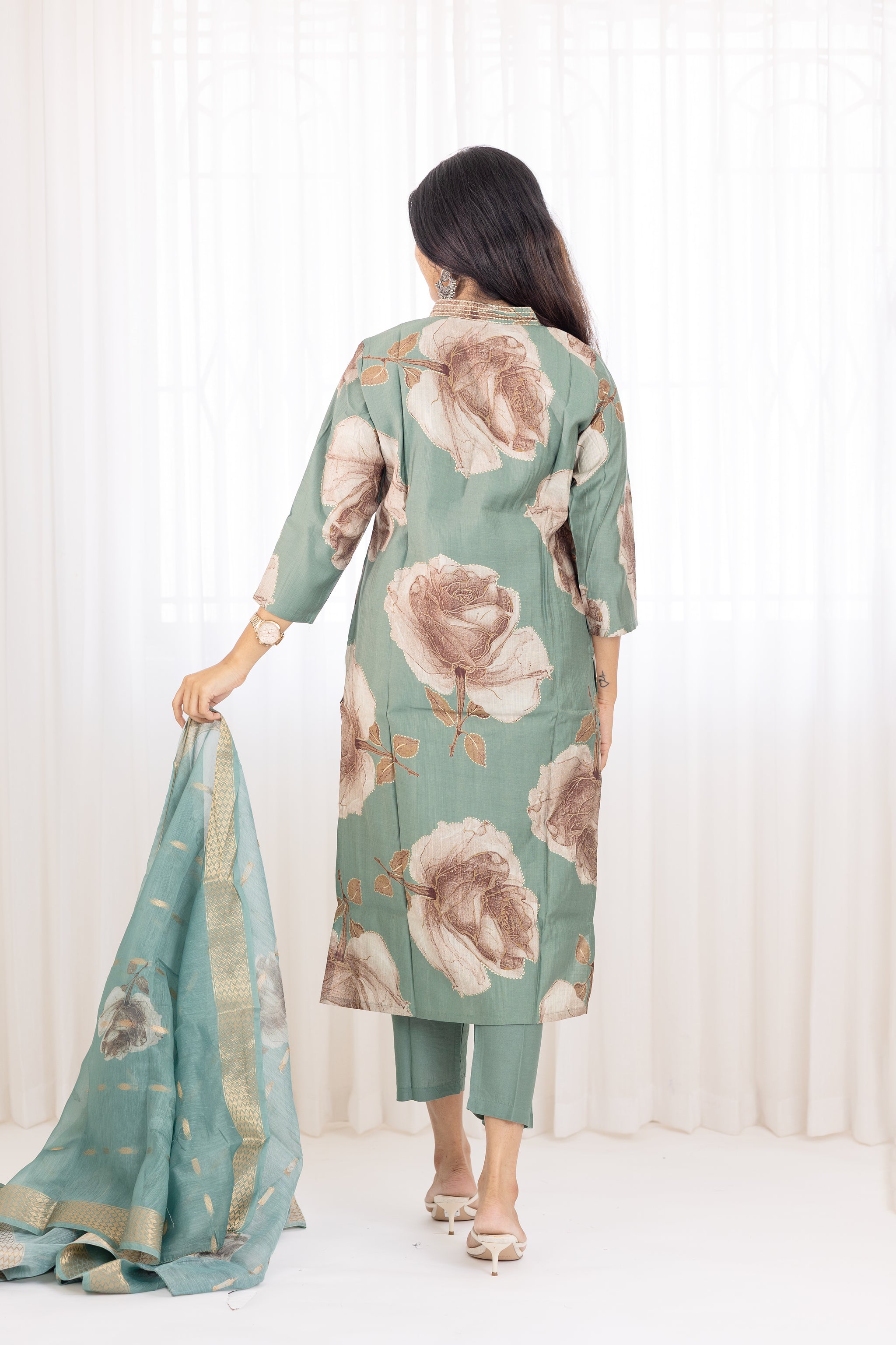 Aaradhana salwar set in light green with vertican fabric