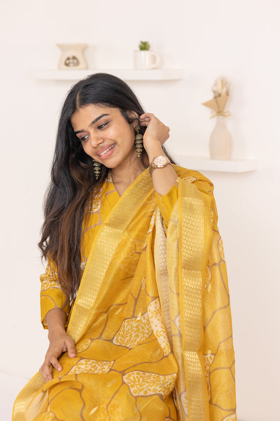 Ziya salwar set in mustard yellow with flower design in vertican fabric
