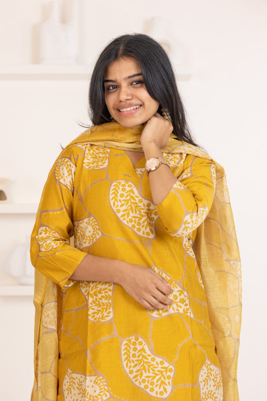 Ziya salwar set in mustard yellow with flower design in vertican fabric