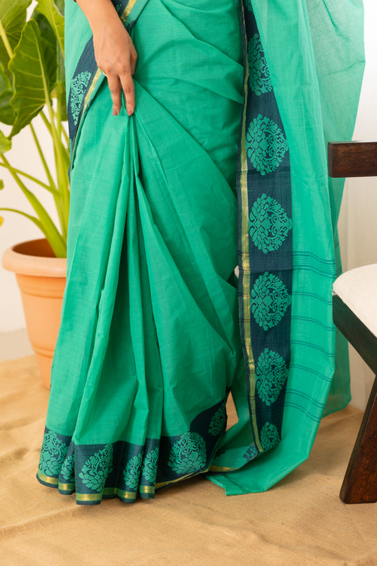Kadal meengal Cotton saree in emerald green ( Own weaving)