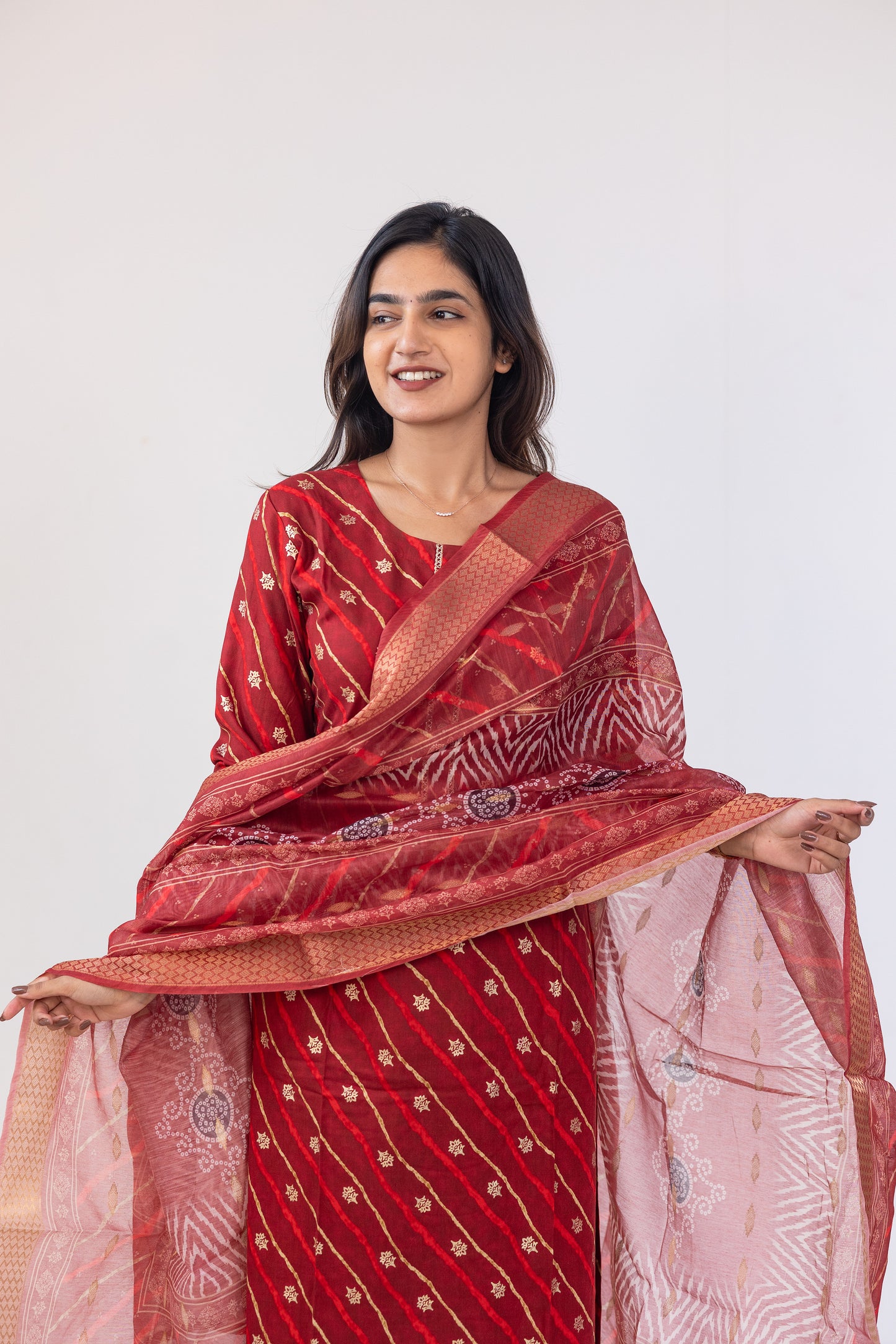Poonguzhali salwar set in red