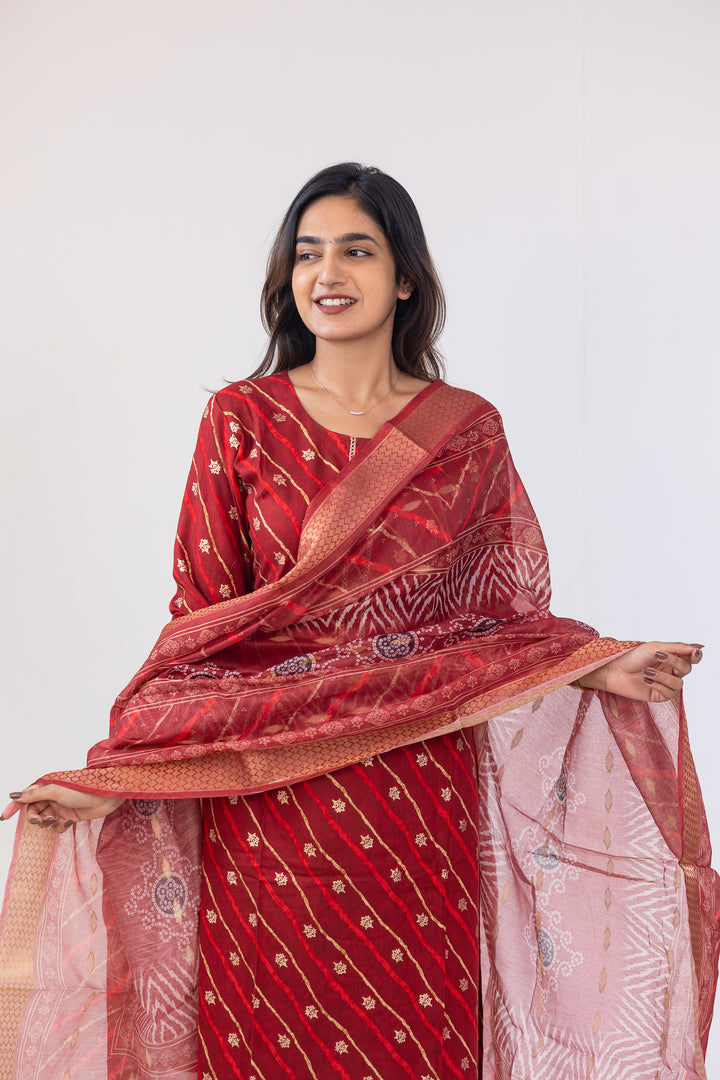 Poonguzhali salwar set in red