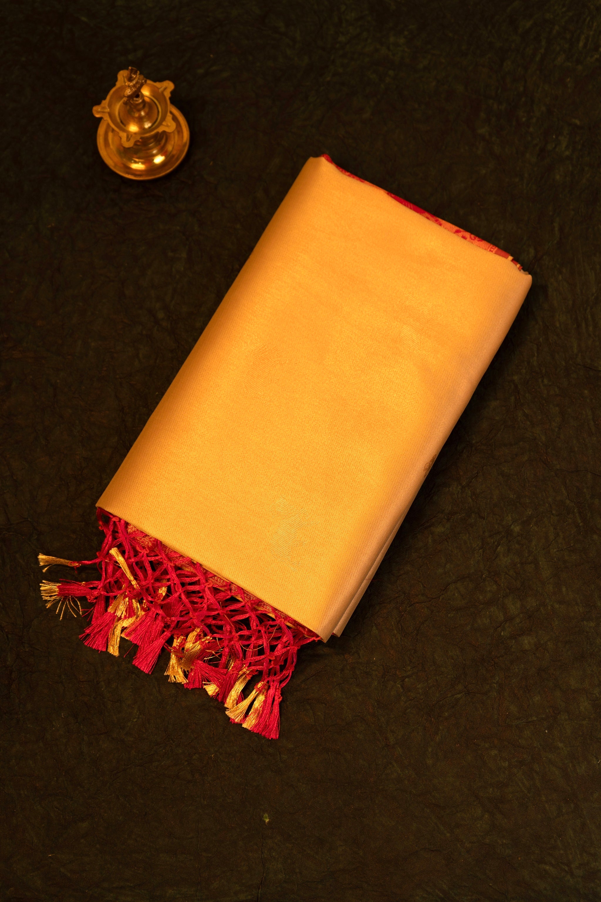 Designer saree in Cream with Red Zari Border