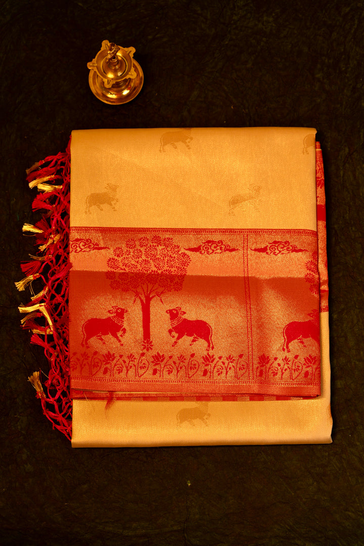 Designer saree in Cream with Red Zari Border