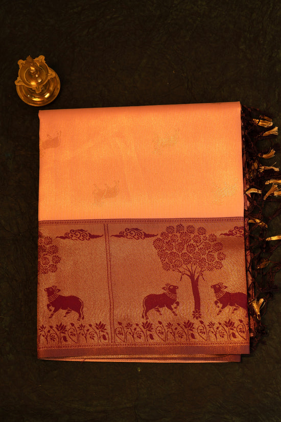 Designer saree in Peach with Maroon Zari Border