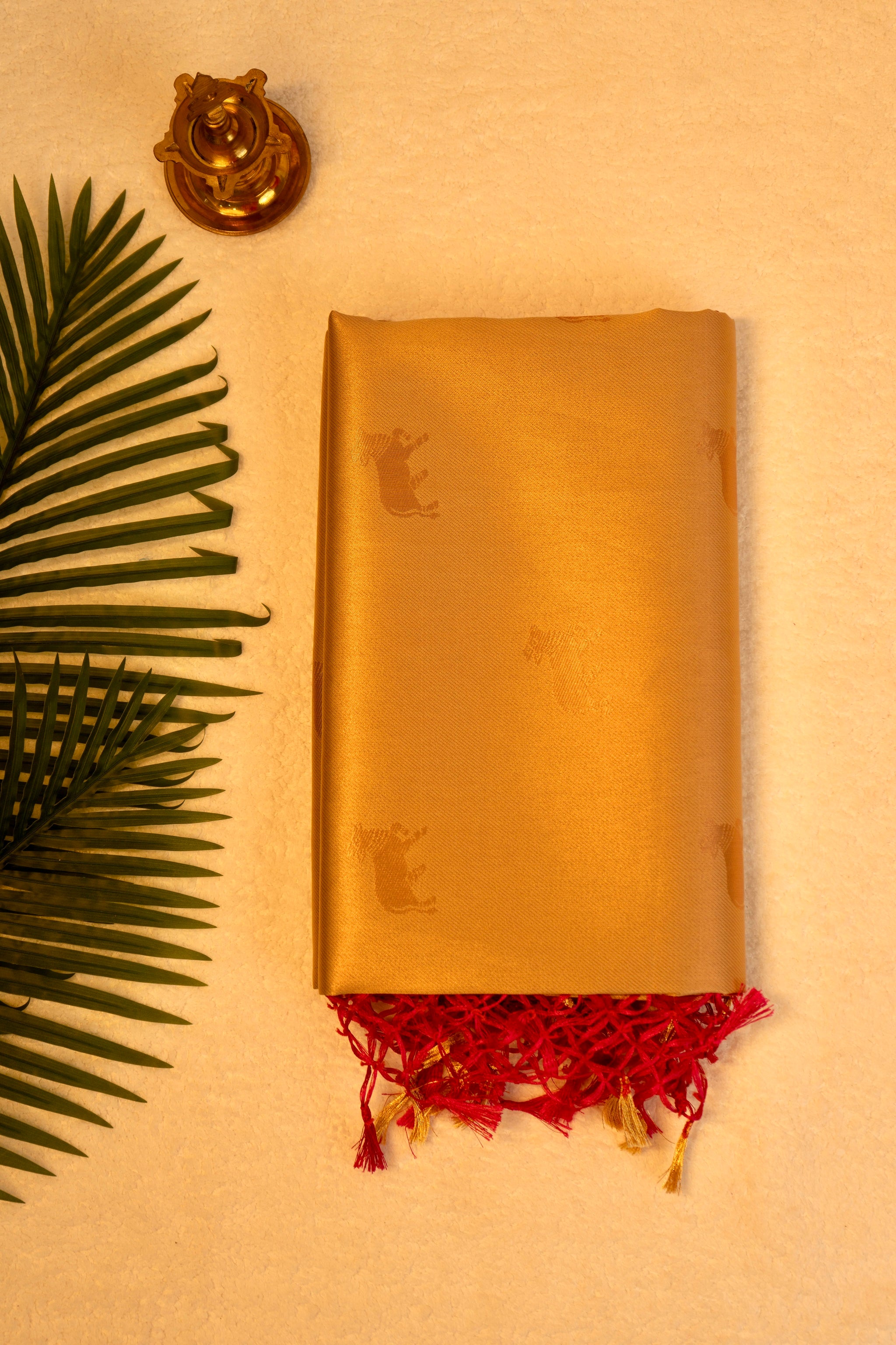 Designer saree in Cream with Red Zari Border