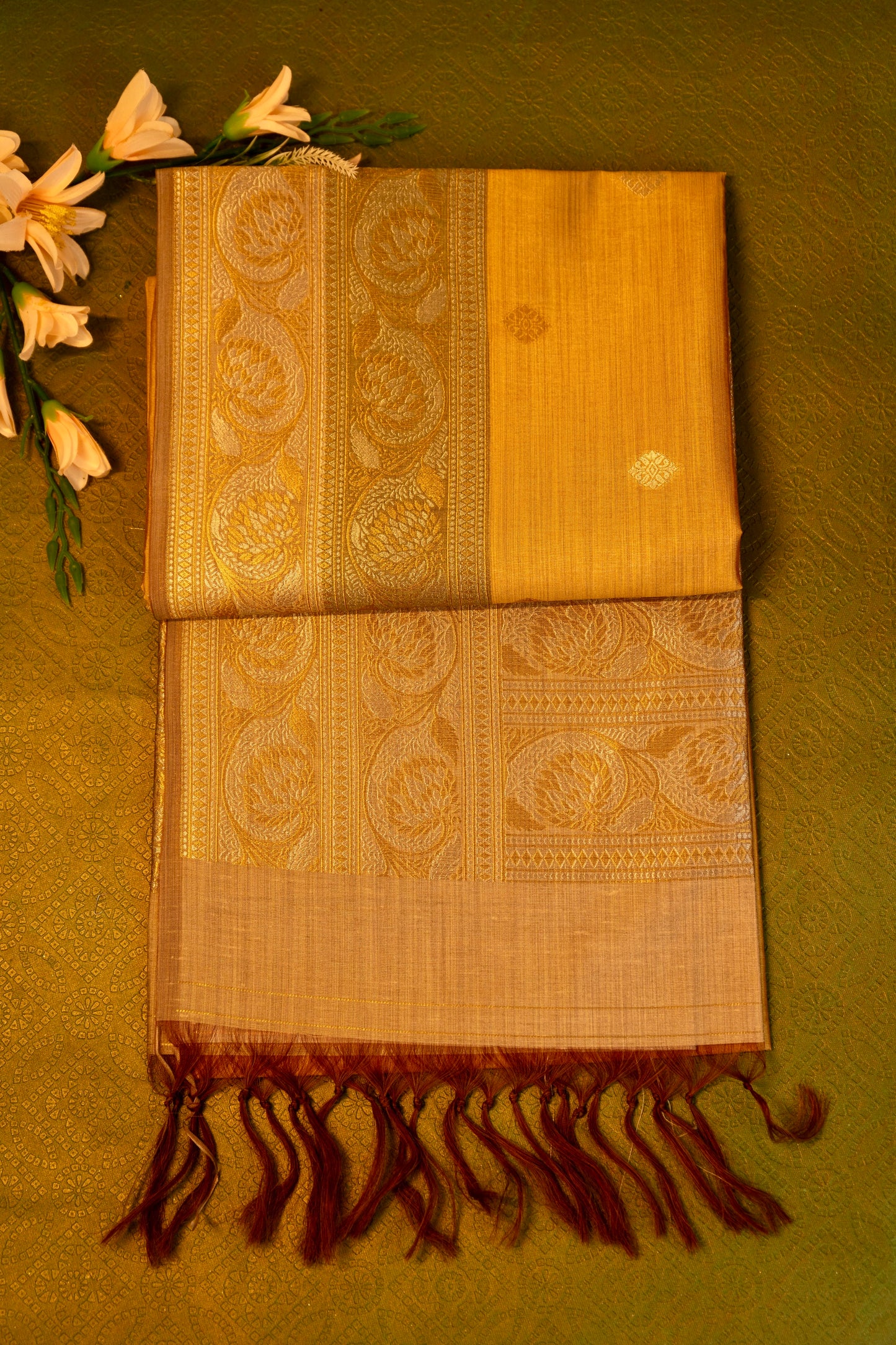 Designer saree in Mustard Yellow with Gold Zari Border