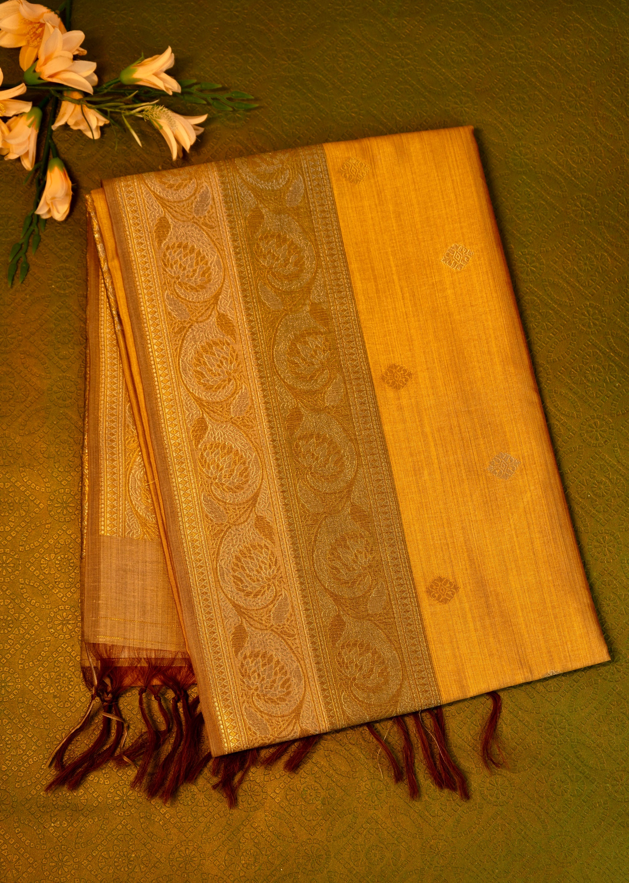 Designer saree in Mustard Yellow with Gold Zari Border