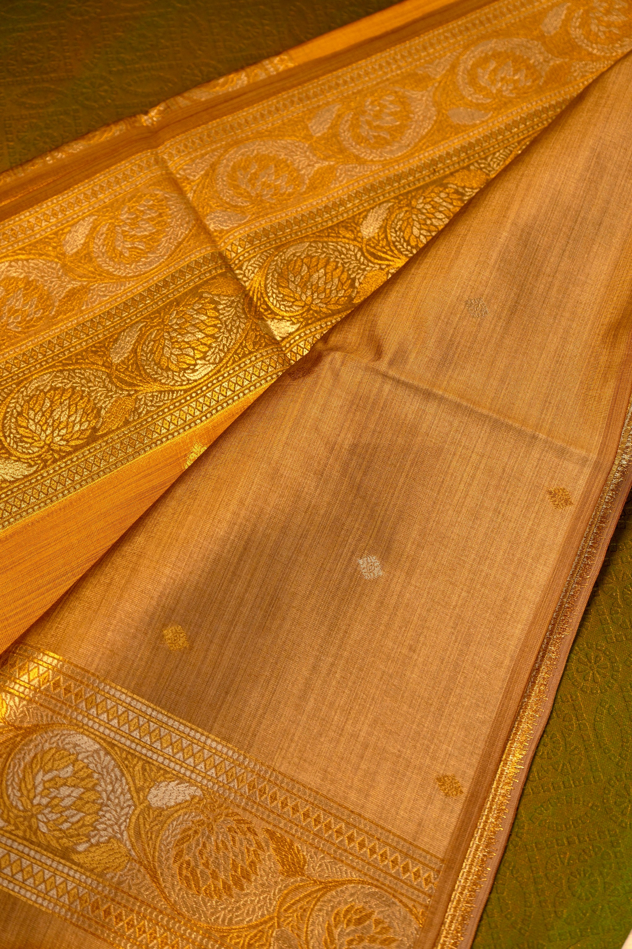 Designer saree in Mustard Yellow with Gold Zari Border