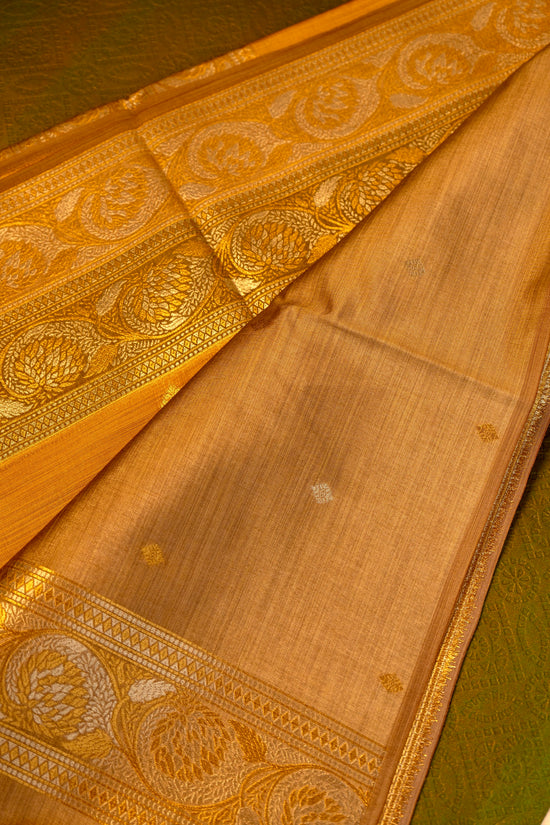 Designer saree in Mustard Yellow with Gold Zari Border