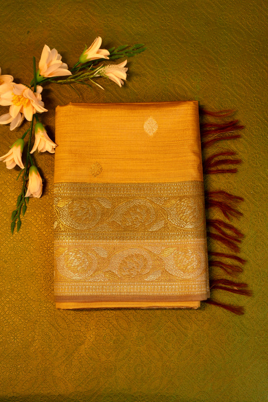 Designer saree in Mustard Yellow with Gold Zari Border