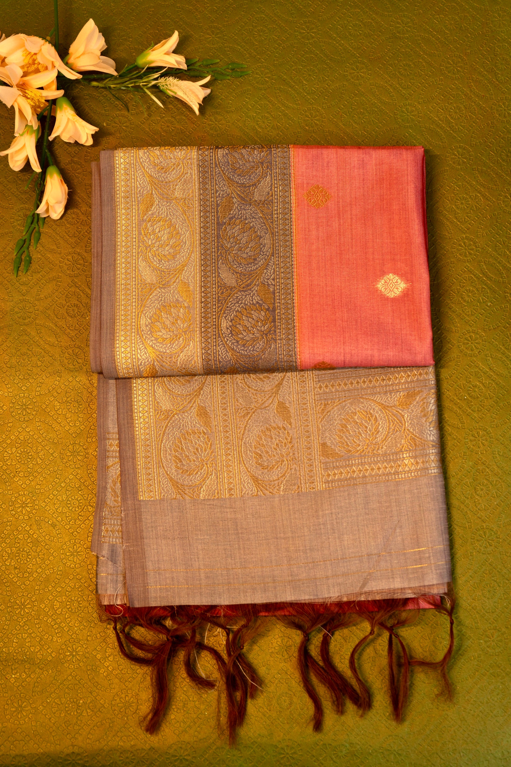 Soft silk  saree in Peach with Gold Zari Border