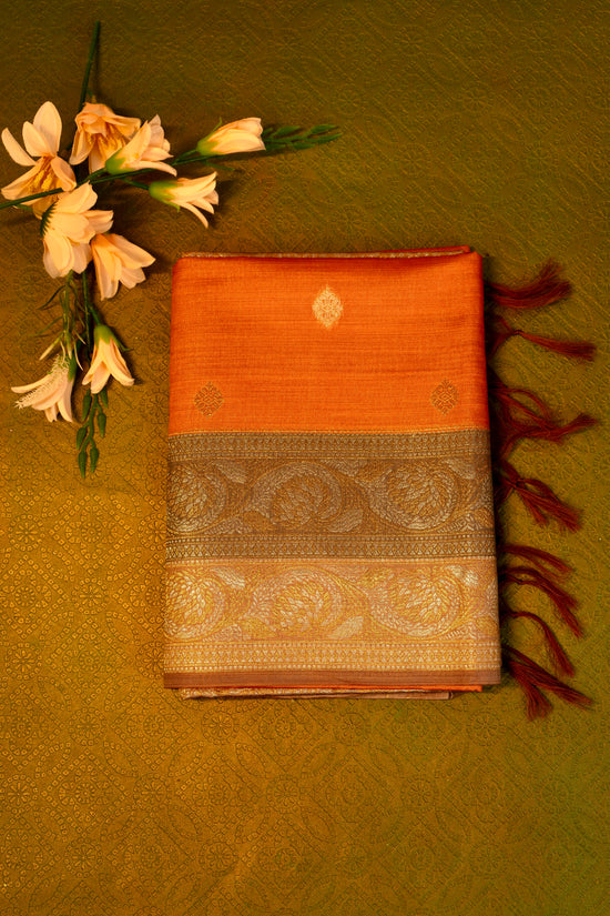 Soft silk  saree in orange with Gold Zari Border