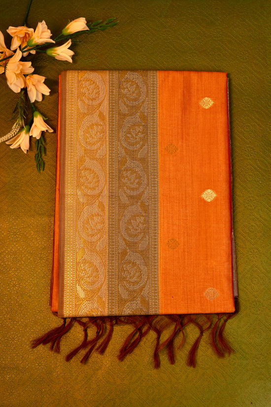 Soft silk  saree in orange with Gold Zari Border