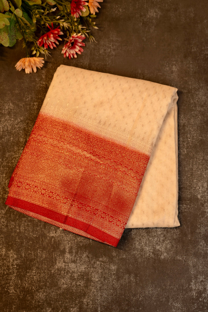Tissue georgette saree in off white and red with silver zari