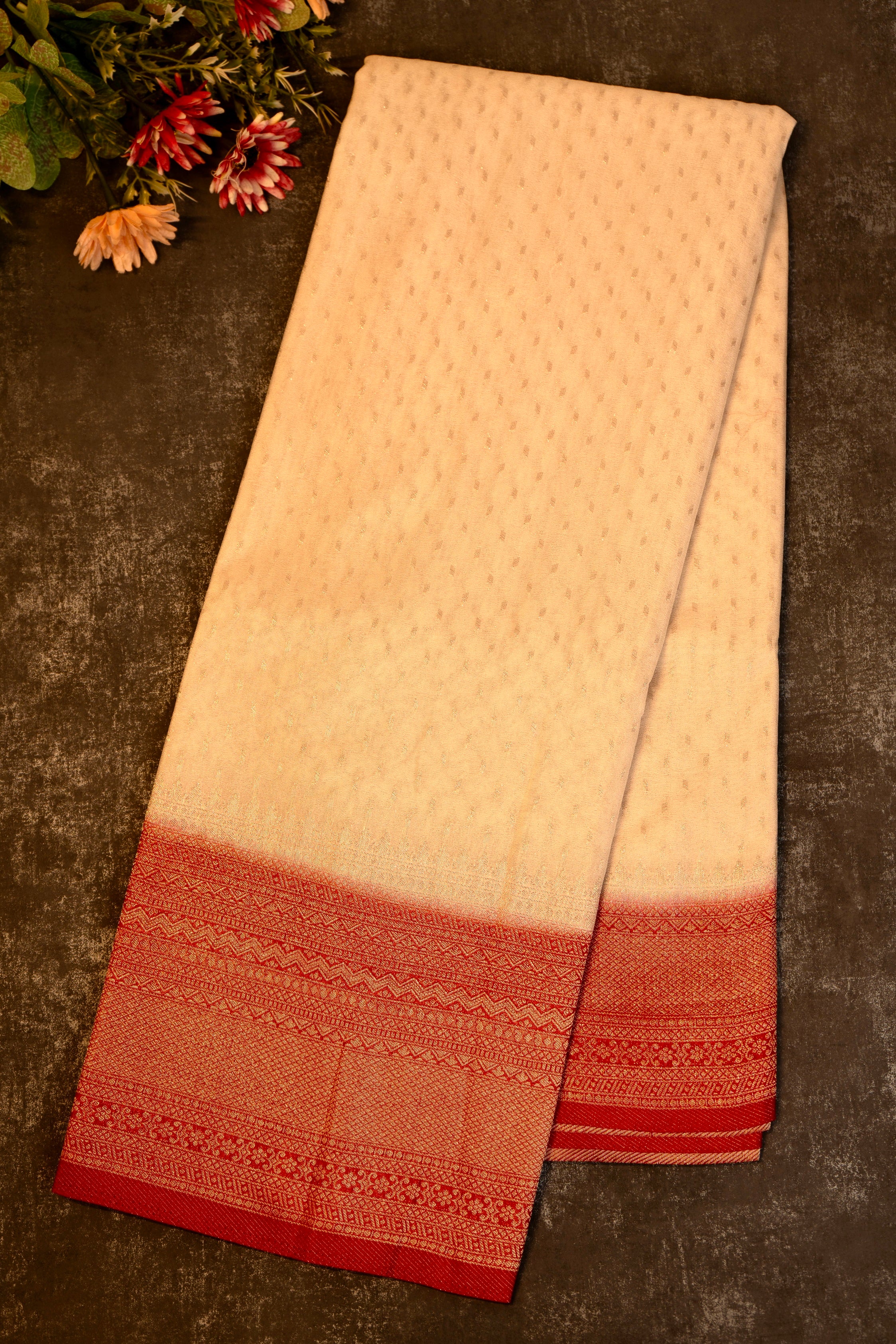 Tissue georgette saree in off white and red with silver zari