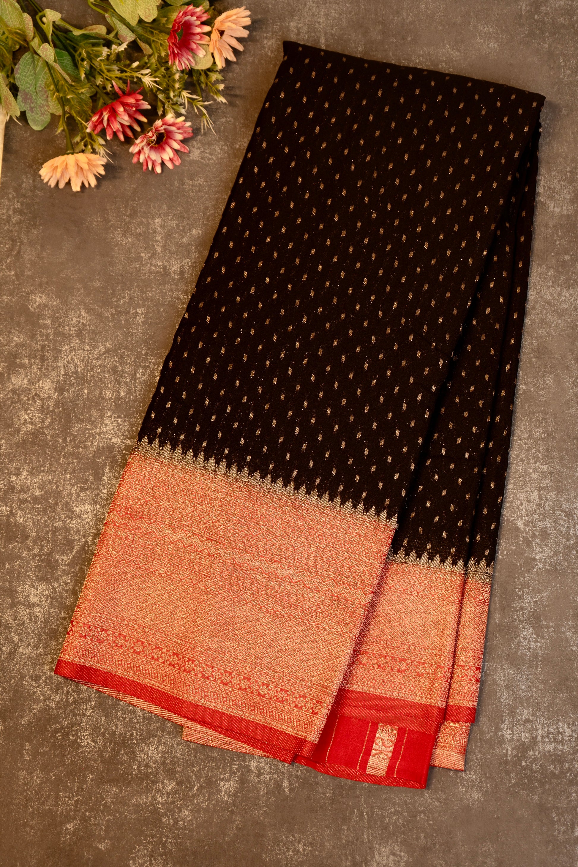 Tissue georgette saree in black and red with silver zari