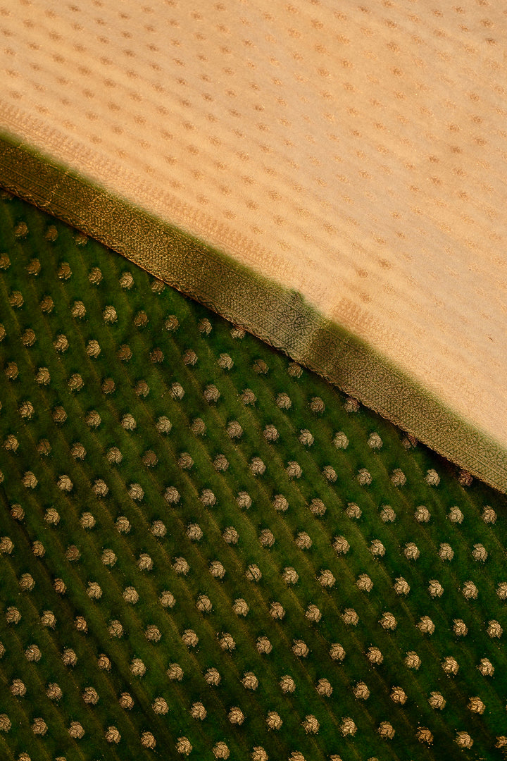 Tissue georgette saree in offwhite and dark green with silver zari