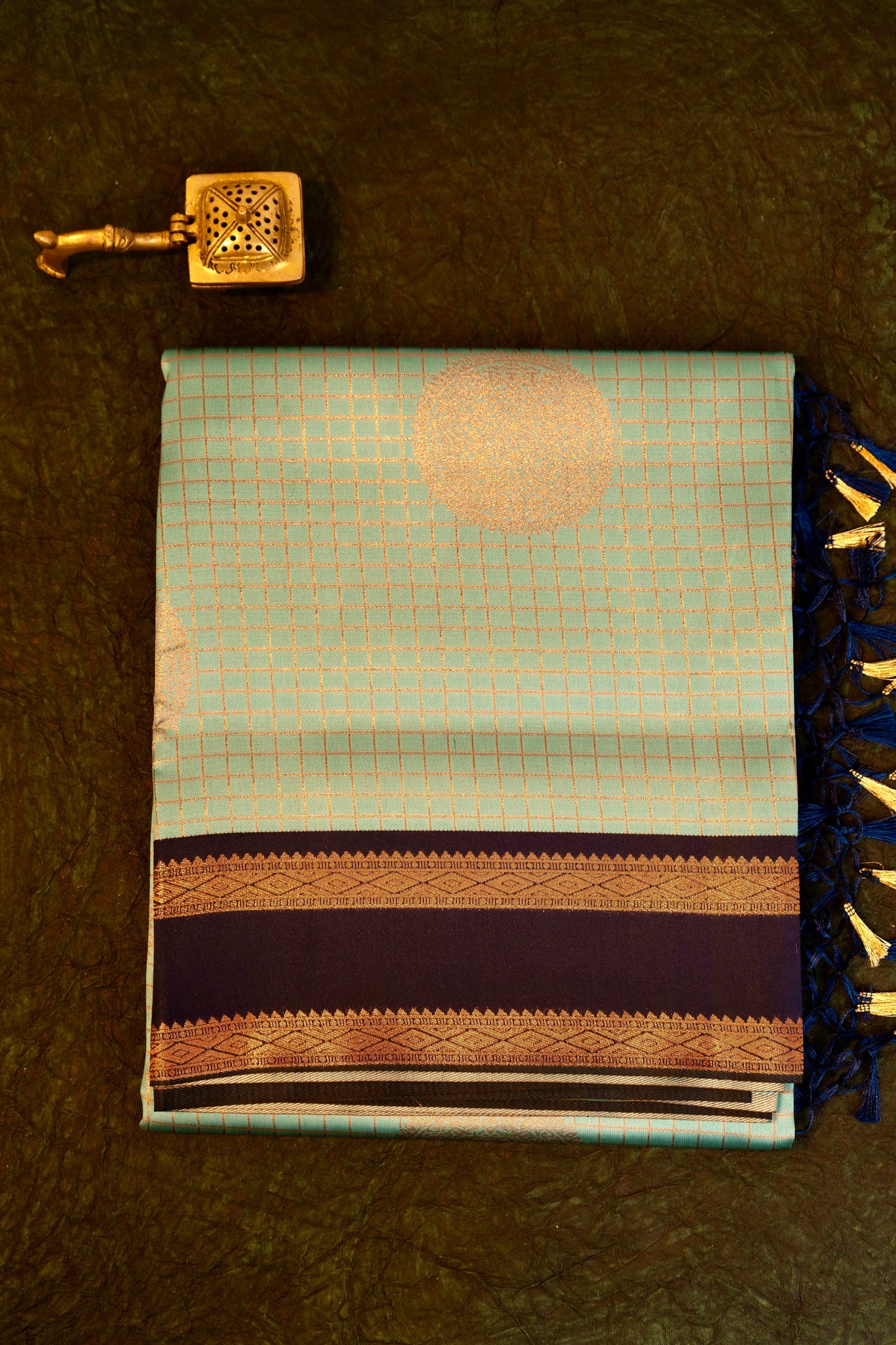 Designer saree in pista pastel green with gold zari