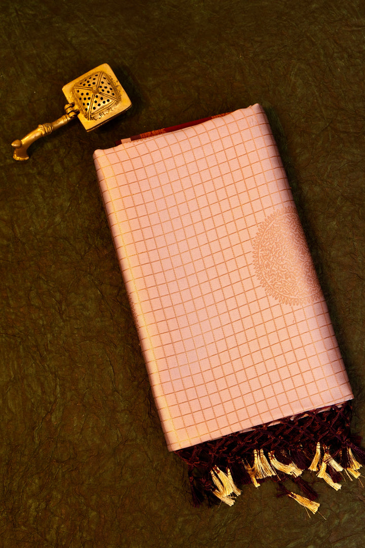 Designer saree in lotus pastel pink with gold zari