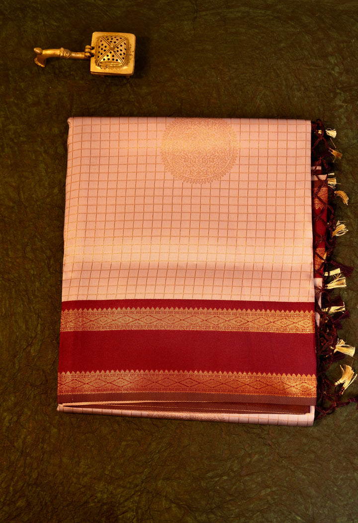 Designer saree in lotus pastel pink with gold zari