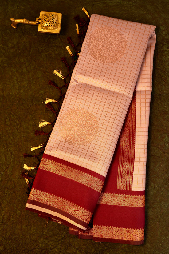 Designer saree in lotus pastel pink with gold zari