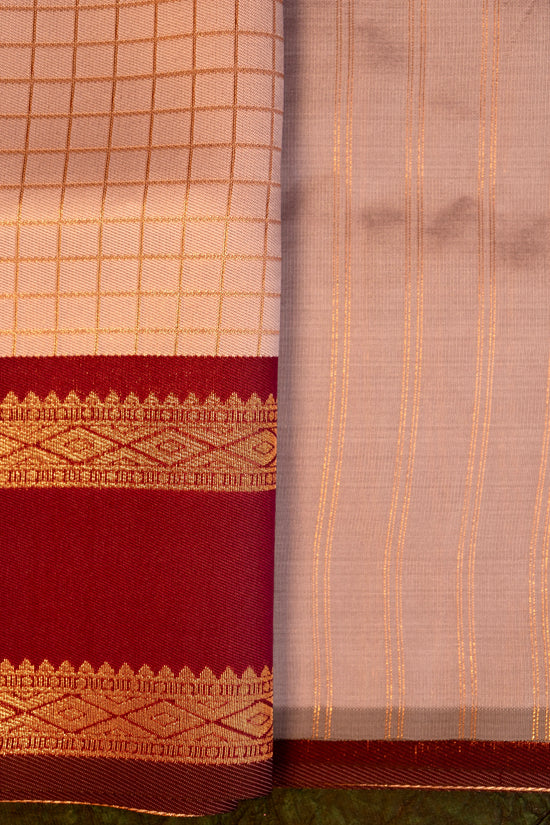 Designer saree in lotus pastel pink with gold zari