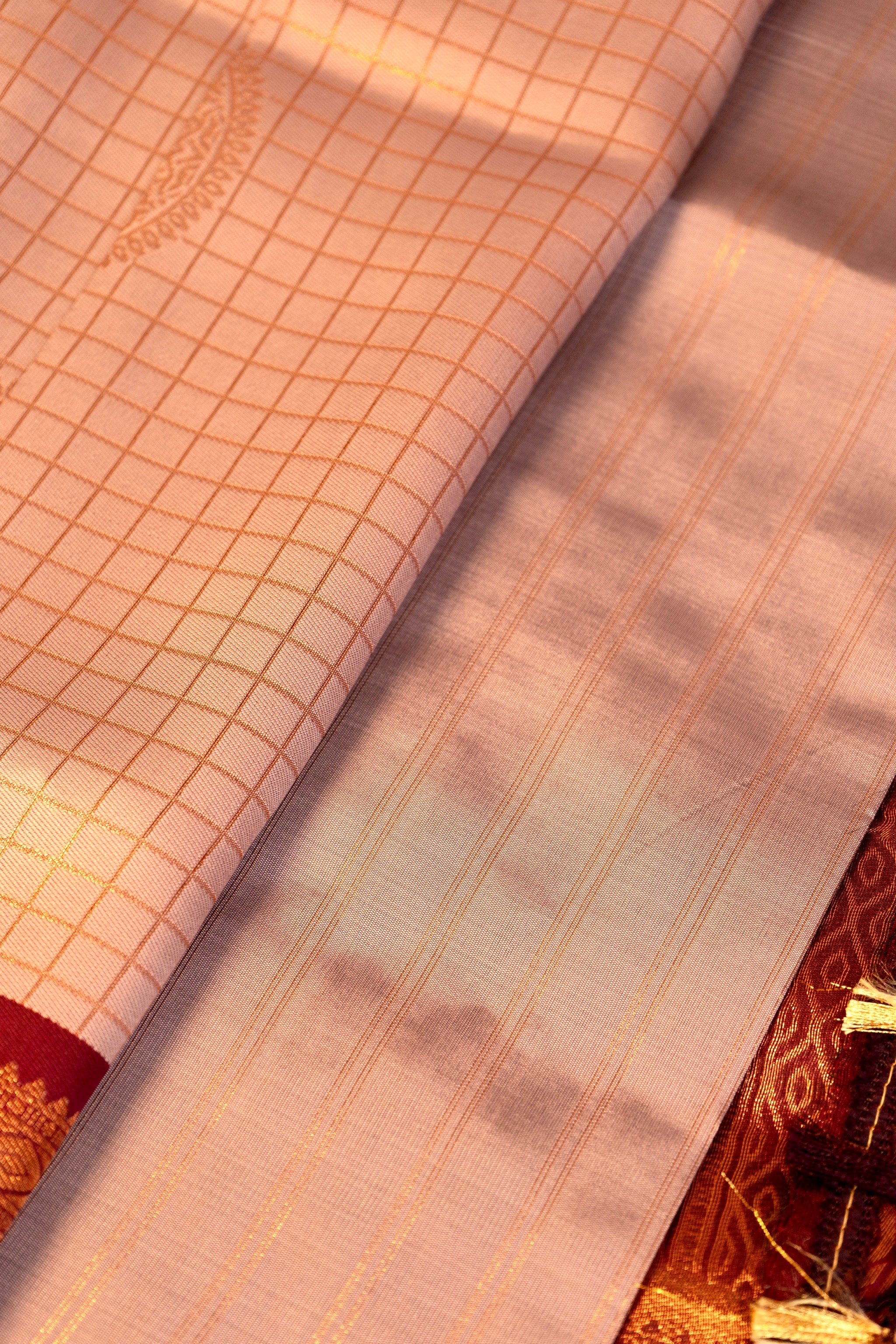 Designer saree in lotus pastel pink with gold zari