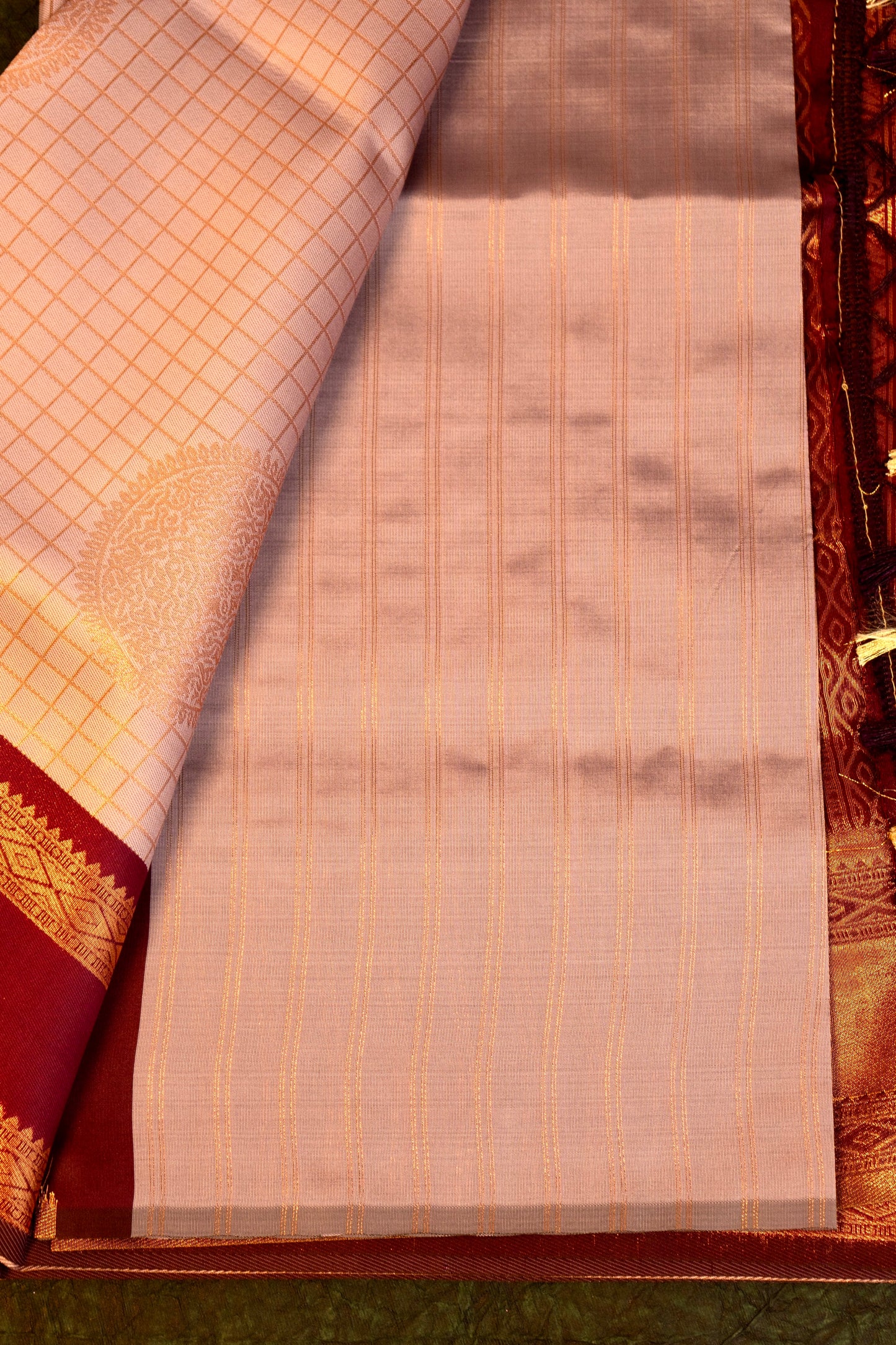 Designer saree in lotus pastel pink with gold zari