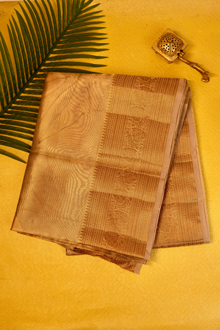 Designer saree in brown gold with floral paisley motifs